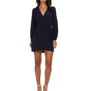 Navy cocktail dress with long sleeves